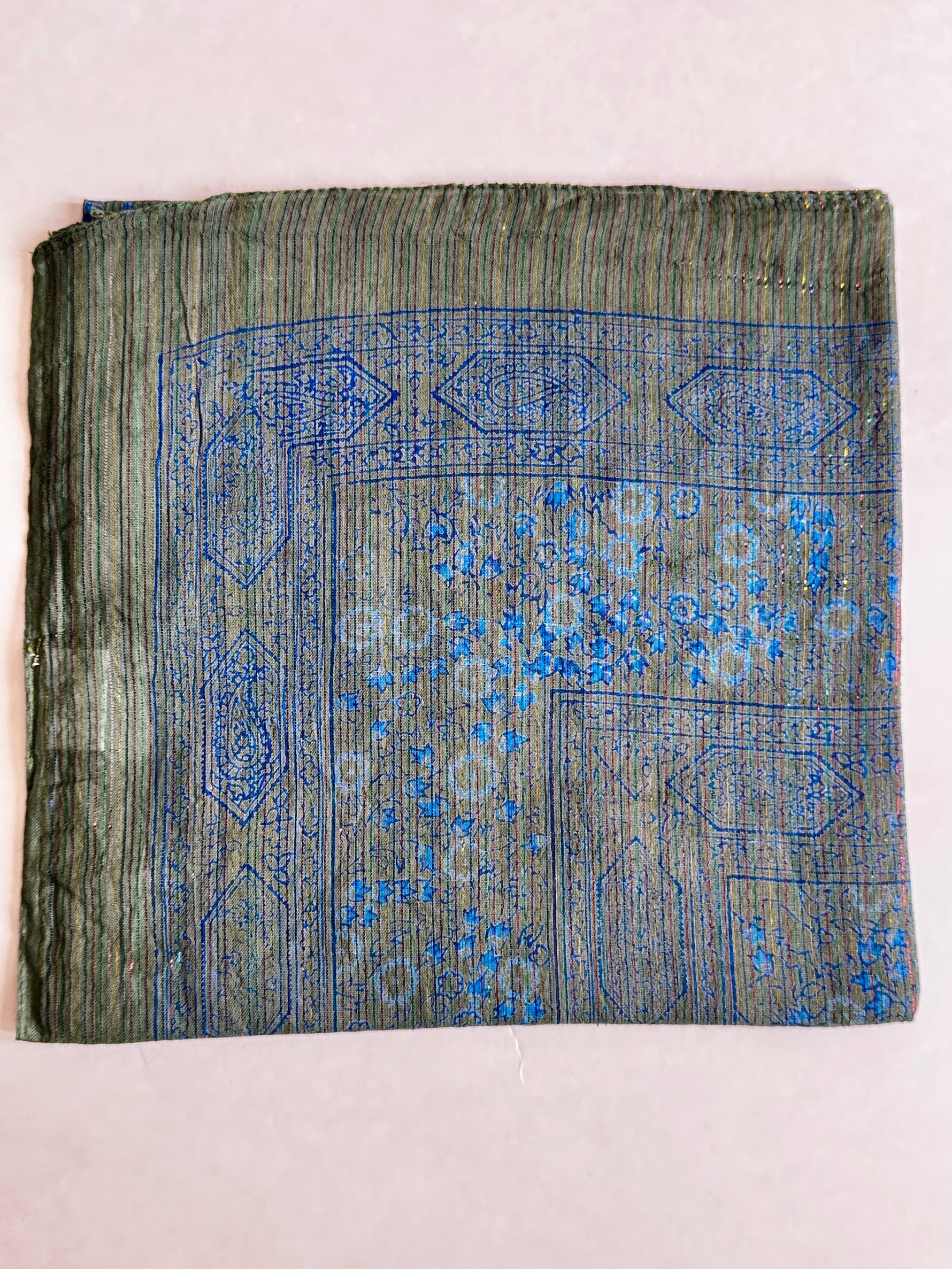 Teal cotton square scarf woven with sparkly lurex threads and a blue printed pattern